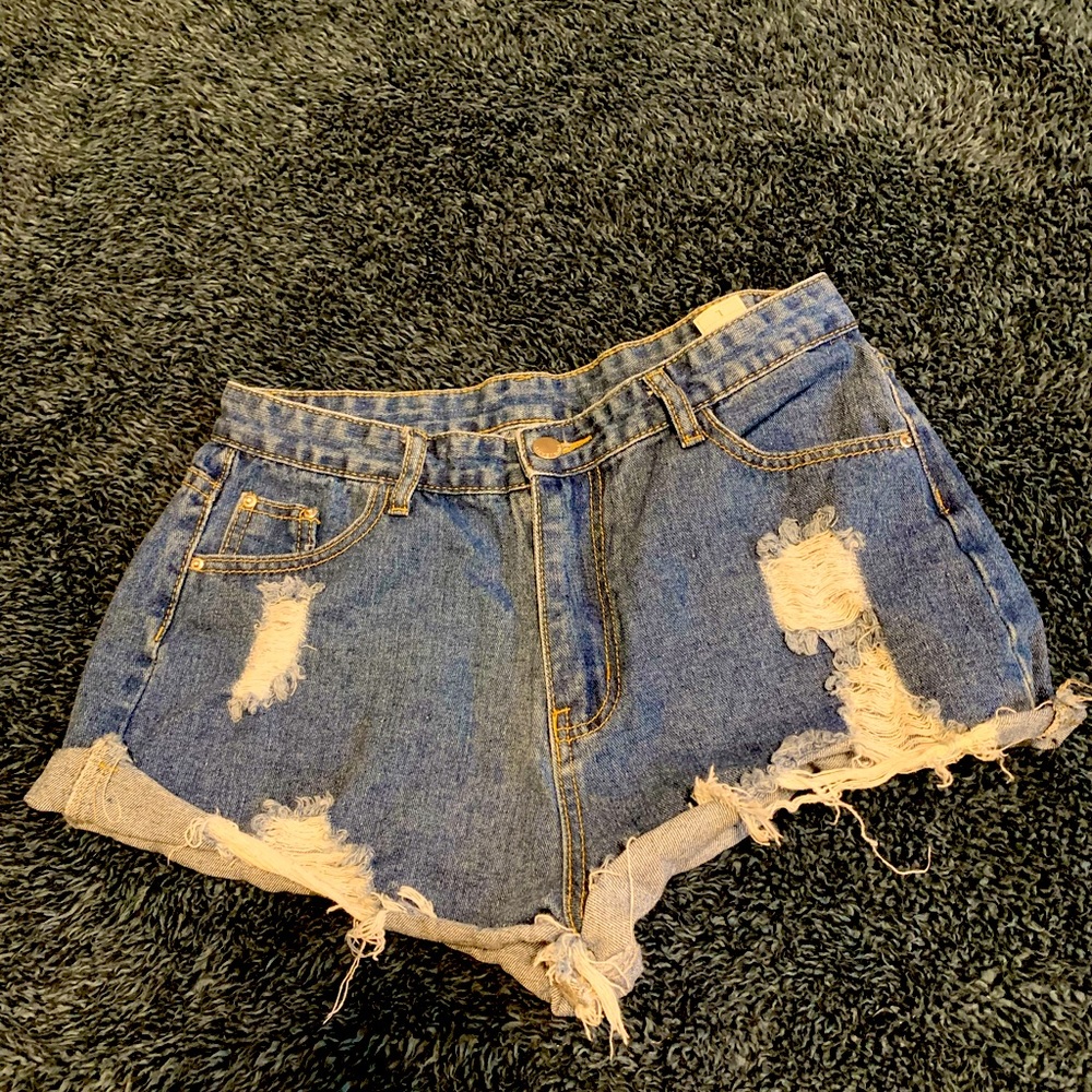 Ripped Jean Shorts - Brand Unknown- Super cute and comfortable. Just didn’t fit.